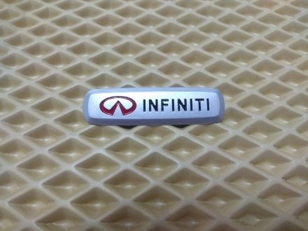 Шильдик (эмблема) для ковриков Infiniti AVTM LGEV10277 (фото 1)