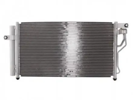 Радіатор кондиціонера THERMOTEC KTT110106 (фото 1)